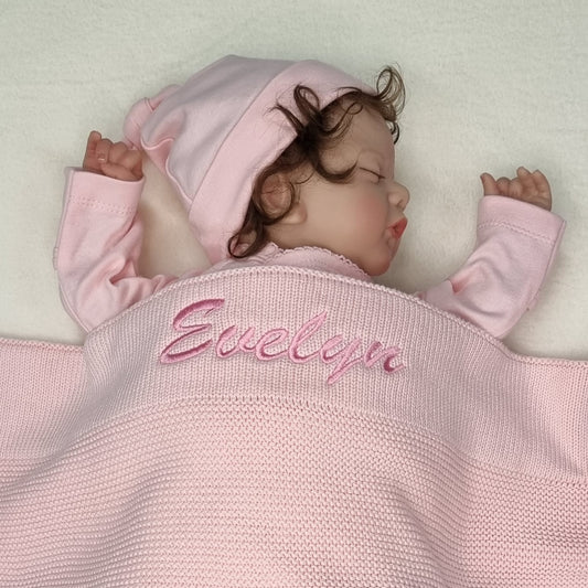 personalised baby blanket pink with pink script writing knitted baby blanket