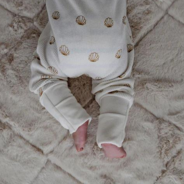 baby crawling wearing ocean design shell print baby romper set