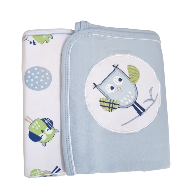 Two baby blankets with owl designs on a white background