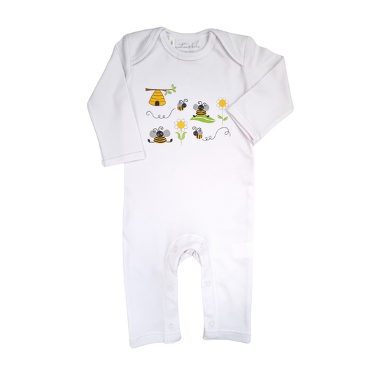 A white baby romper with long sleeves featuring a bumble bee design with a bee hive and bees on the front.