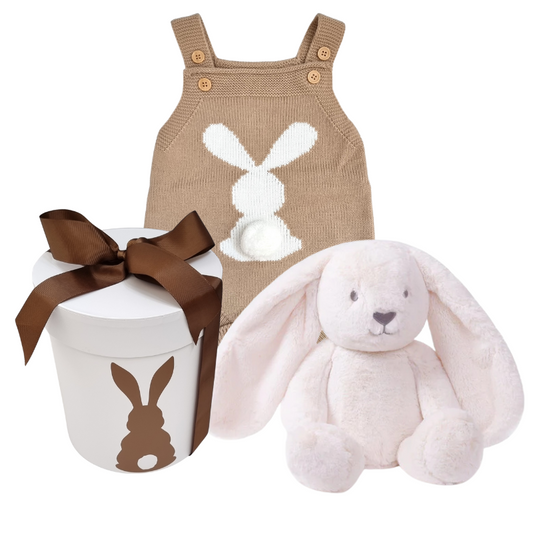 A baby gift hamper set including a neutral toned knitted bunny romper, a plush bunny toy, and a gift hat box with a bunny silhouette design.