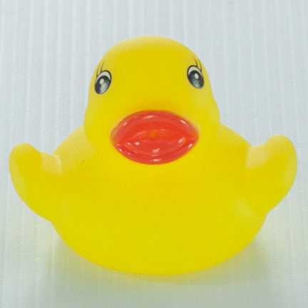 yellow baby bath ducky. squirter toy baby bath toy