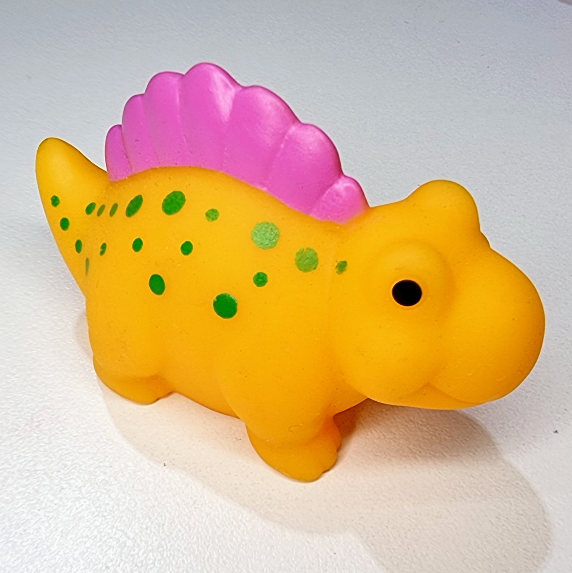 yellow Stegosaurus baby bath toy