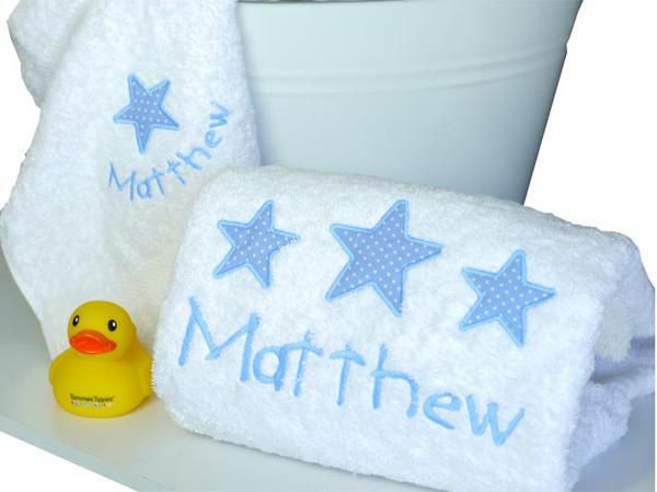 baby boys personalised bath towel & baby robe set embroidered with a blue stars motif and personalised with the baby boys name