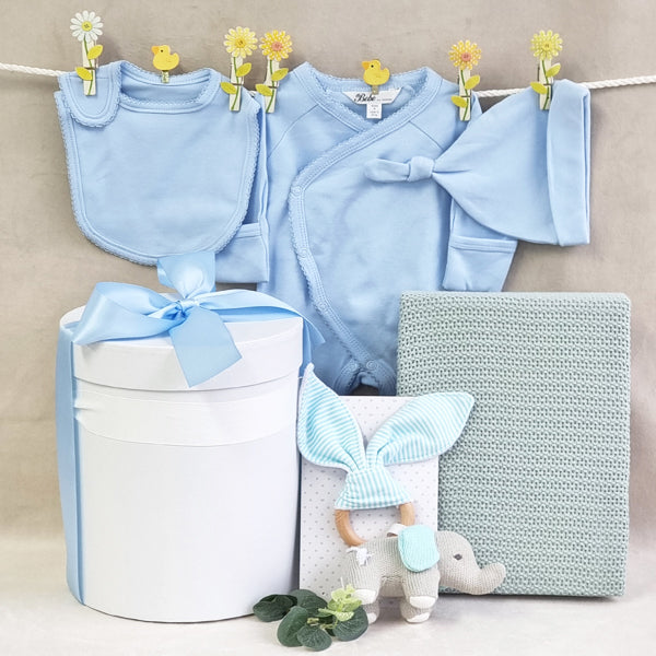 Organic baby boy blue gift hamper with knitted wood elephant teether, organic blanket, bib, beanie and suit.