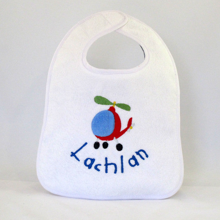 personalised white baby bib with helicopter design embroidered with baby's name