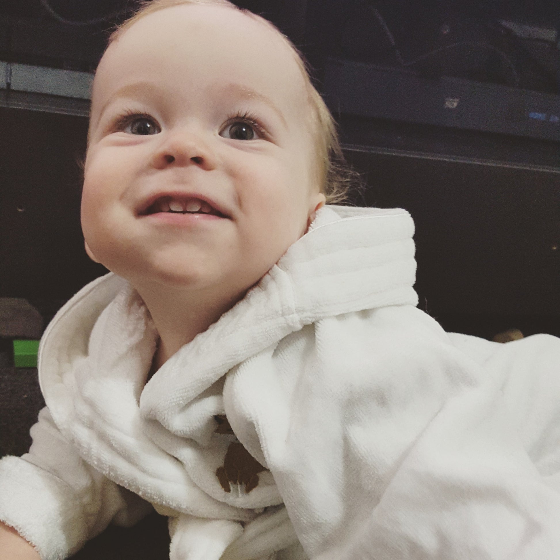 baby wearing personalised baby bath robe