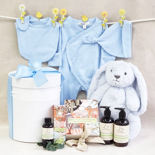 Organic boy baby hamper with blue bib suit beanie and soft bunny with Kakadu Plum baby bath wash moisturiser and belly oil.