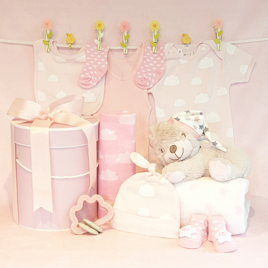 Girls pink baby hamper with cute sleepy bear toy and blanket, muslin wrap, suit, bib, socks, beanie, and singlet. Made in Melbourne Australian owned company