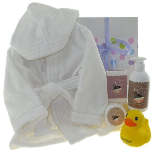 corporate baby gift neutral colour tones with baby robe and natural baby skincare products and a baby bath ducky