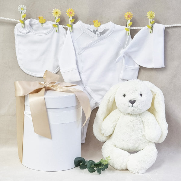 Organic baby neutral white gift hamper with soft bunny, bib, beanie and suit.