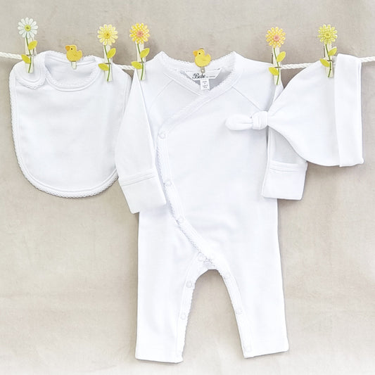 Organic baby neutral white clothing set with suit, bib and beanie.