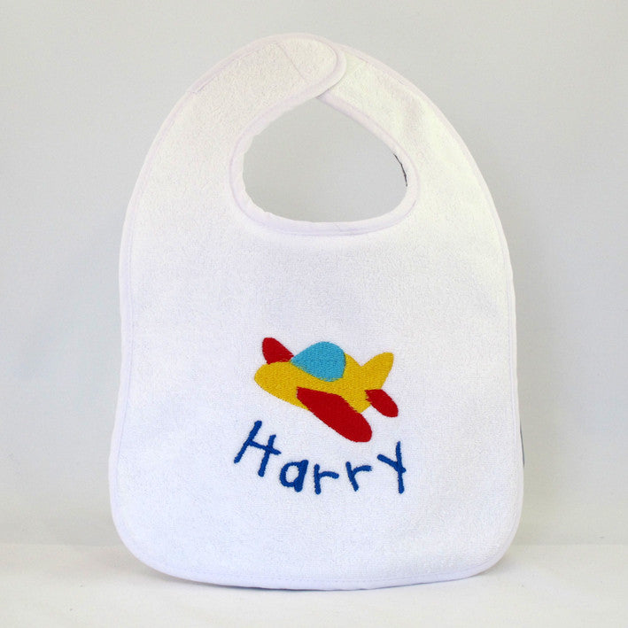personalised white baby bib embroidered with plane design and name
