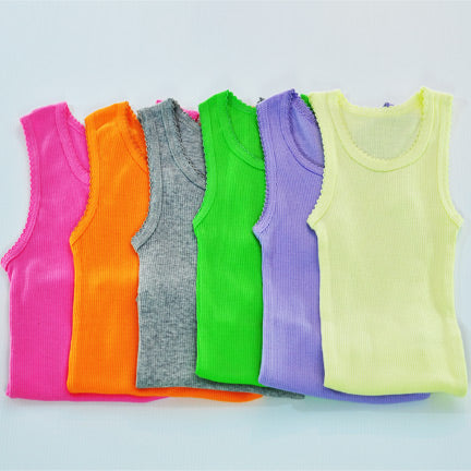 mixture of coloured baby singlets