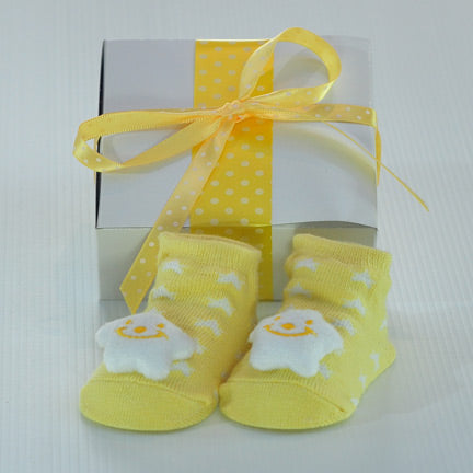 neutral baby rattle socks gift boxed yellow