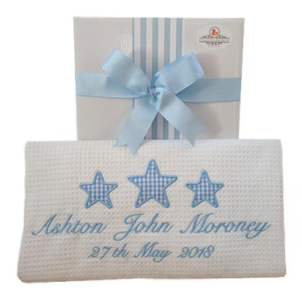 personalised Christening blanket 100% cotton with baby blue stars motif and personalised with baby's full name and christening details