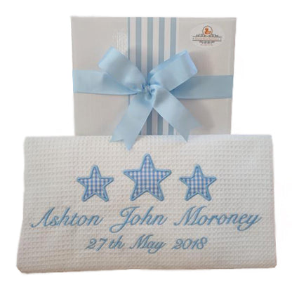 personalised Christening blanket 100% cotton with baby blue stars motif and personalised with baby's full name and christening details